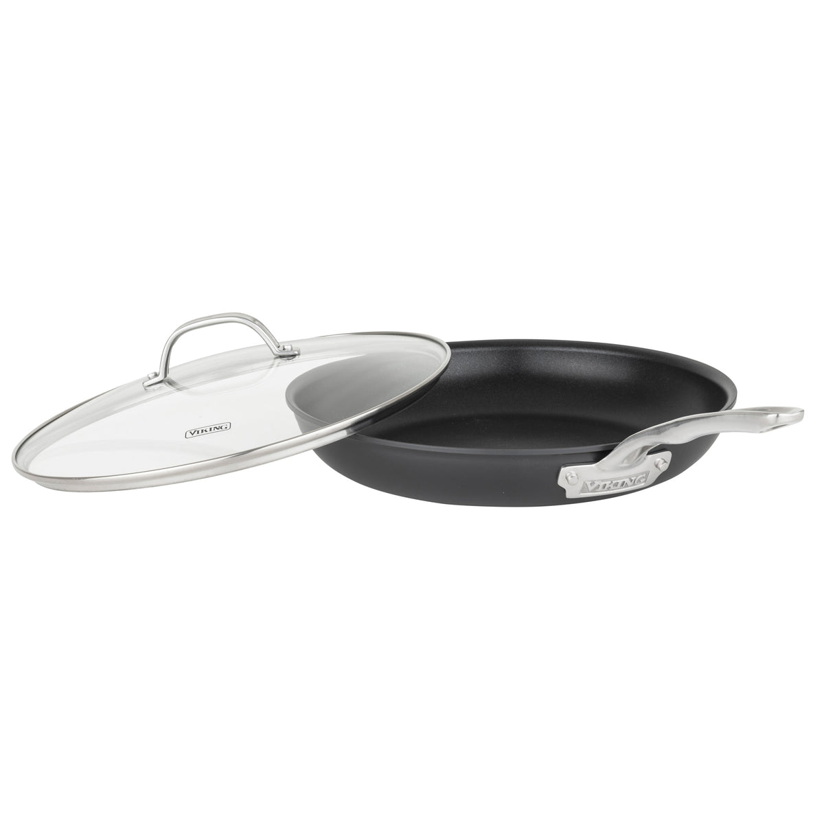A black Viking Culinary Products Hard Anodized Ceramic Nonstick 12pc Cookware set is shown, featuring a frying pan with a stainless steel handle and matching glass lid, both branded. This PFAS-free cookware ensures safe, healthy cooking.