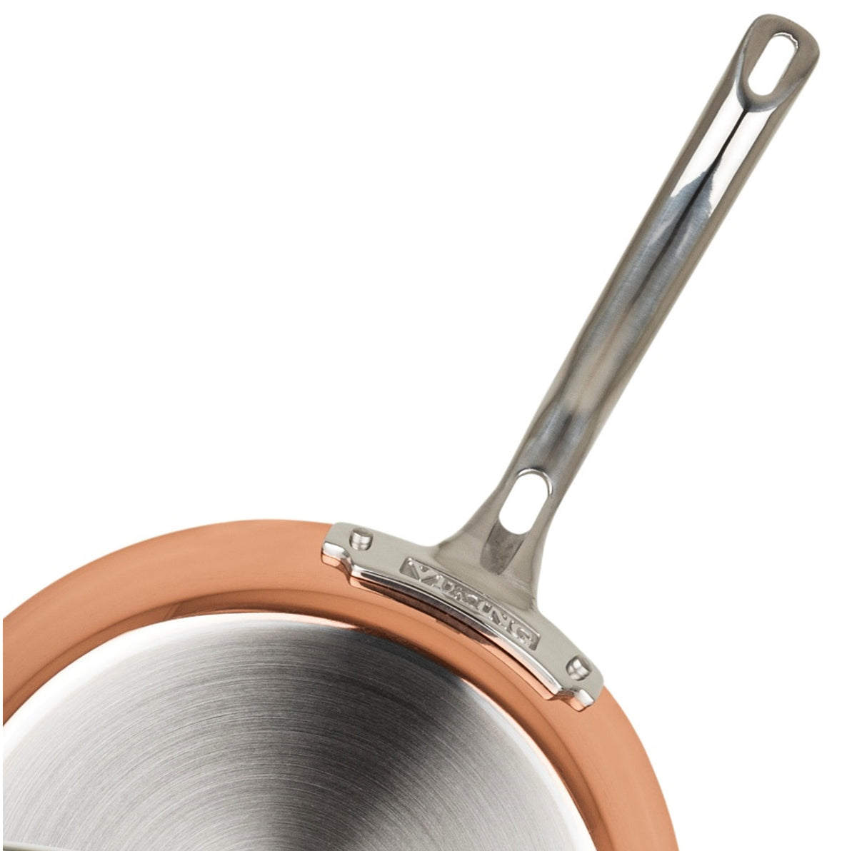A close-up view of a stainless steel frying pan with a copper-colored rim and a shiny, long metal handle featuring a small brand label near the base.