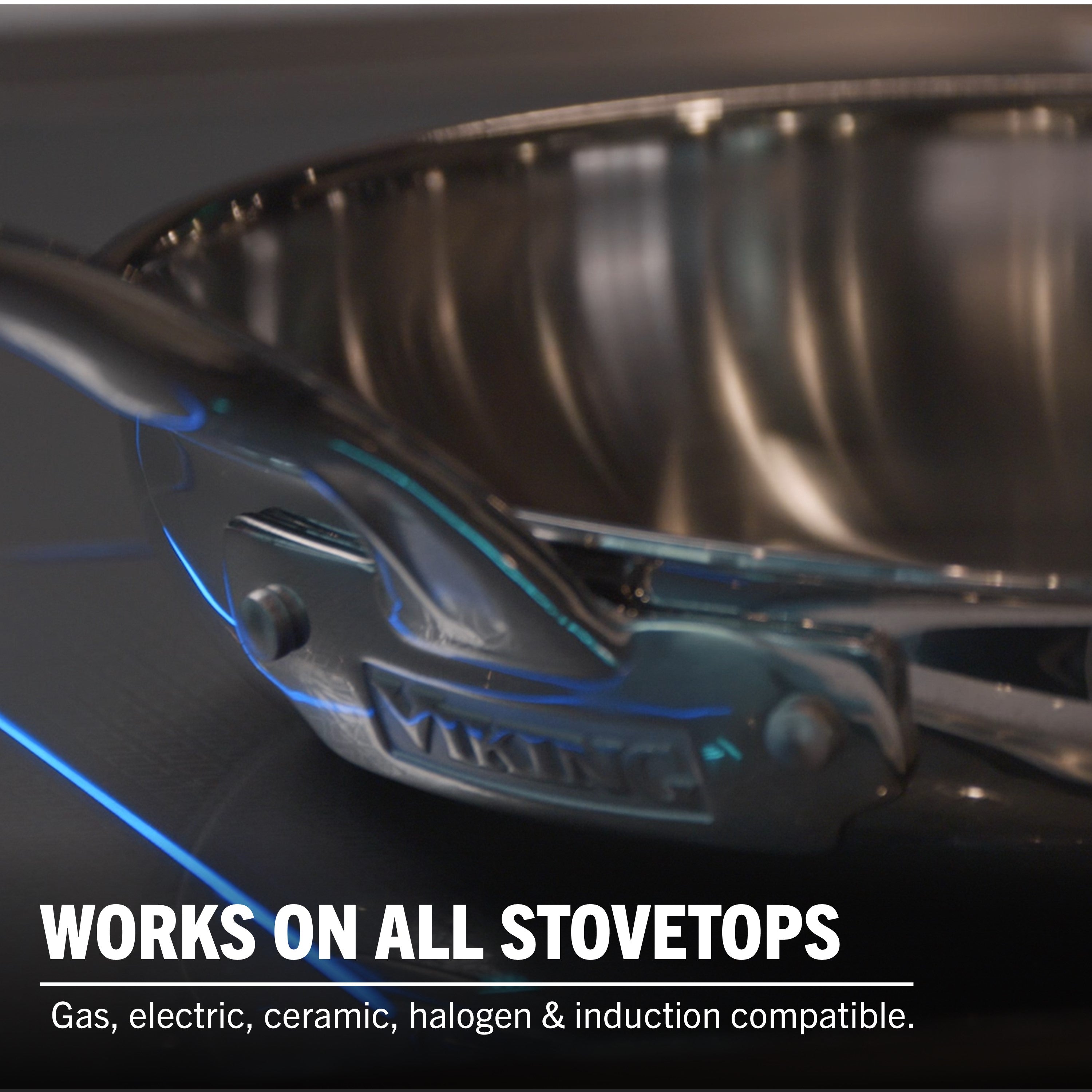 Close-up of Viking Artisan 3-Ply 2-Piece Fry Pan Set (10" & 12") by Viking Culinary Products on a stovetop with blue light accents. Text overlay: Works on all stovetops—gas, electric, ceramic, halogen & induction compatible.