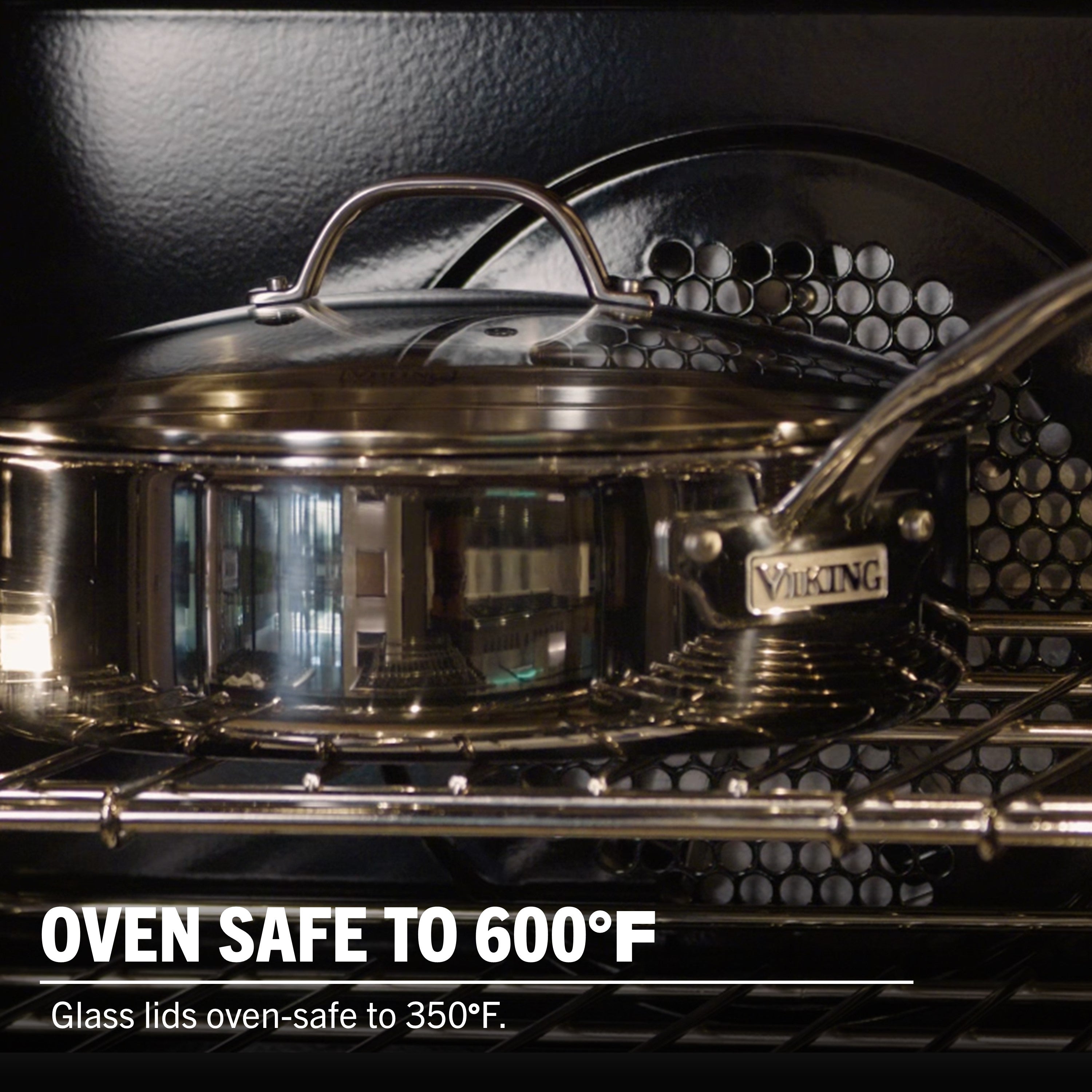 A Viking Culinary Products Artisan 3-ply Stainless Steel 11-Piece Cookware Set with Glass Lids sits on an oven rack. Oven safe to 600°F, glass lids up to 350°F. Induction compatible for versatile cooking.