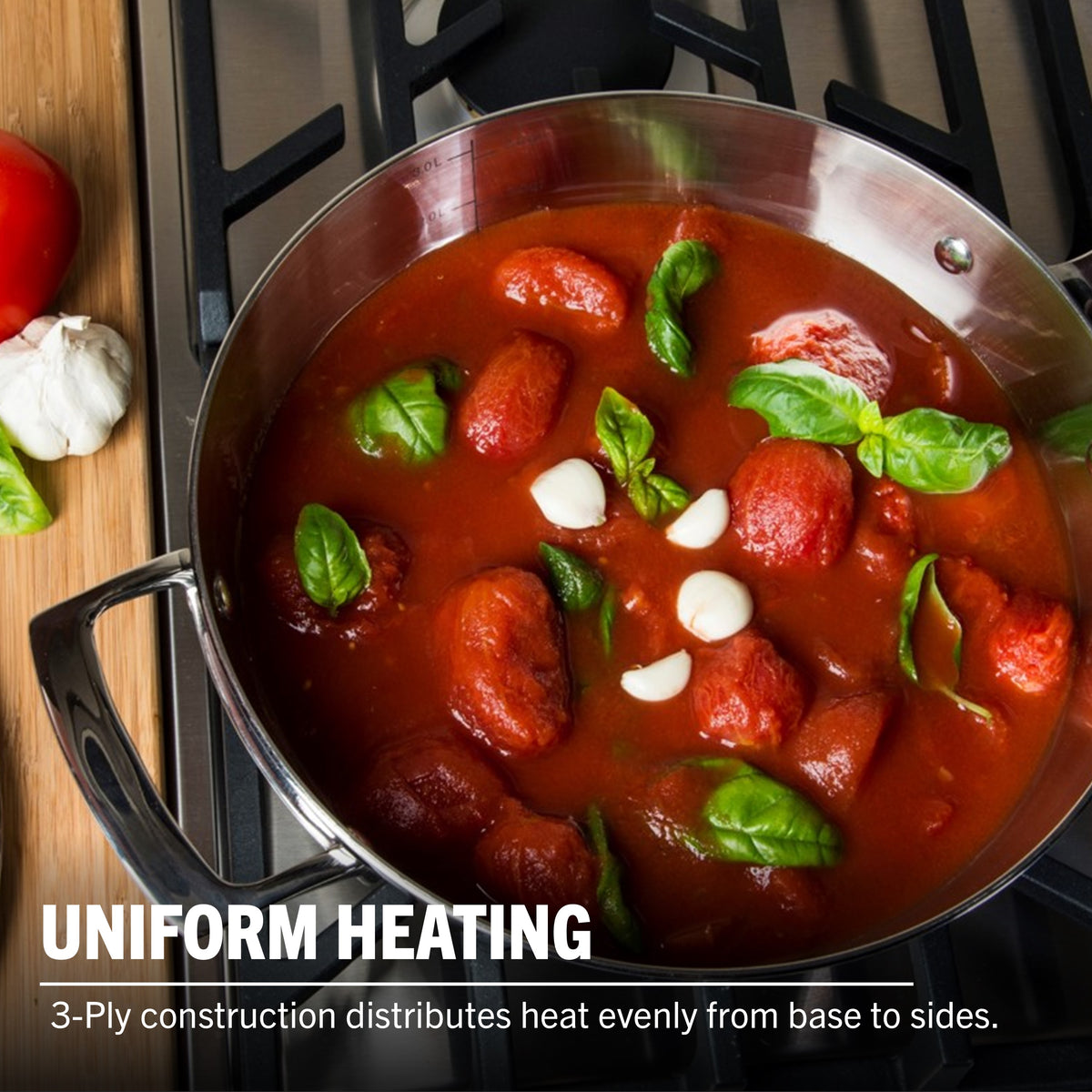 A Viking Culinary Products Viking Contemporary 3-Ply Stainless Steel 8-Quart Stock Pot on the stove with tomato sauce. Text: Uniform heating—induction compatible, 3-ply stainless steel distributes heat evenly from base to sides.