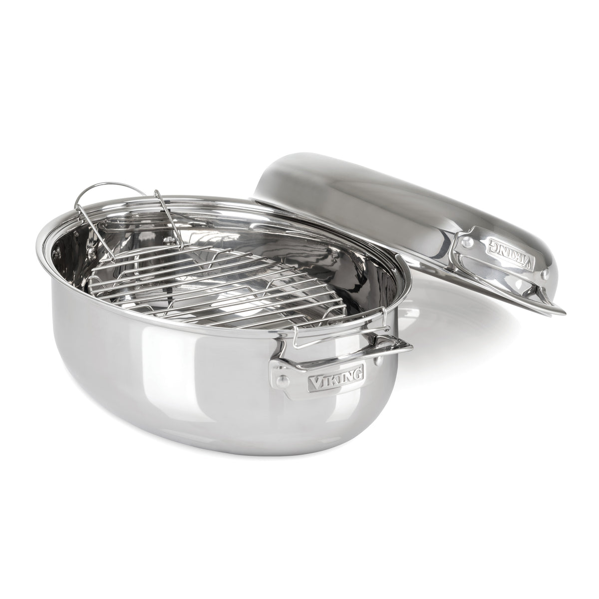 The Viking Culinary Products 3-Ply 8.5-Quart 3-in-1 Oval Roaster with Rack features sturdy Viking-labeled handles and comes with a matching induction lid, which rests beside the oval stainless steel pan.