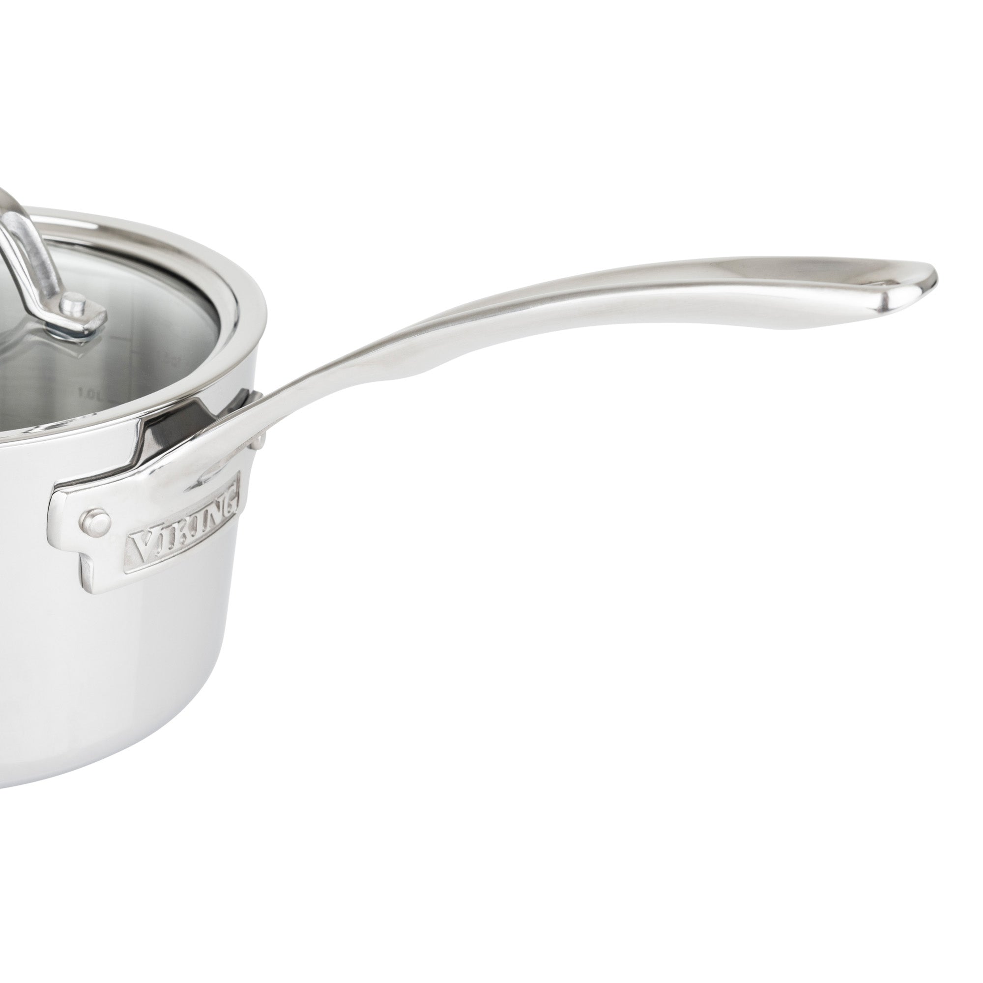A close-up of the Viking Culinary Products Contemporary 3-Ply Stainless Steel 7-Piece Cookware Set shows a saucepan with a glass lid, engraved logo near the long handle, and induction compatibility for versatile cooking.