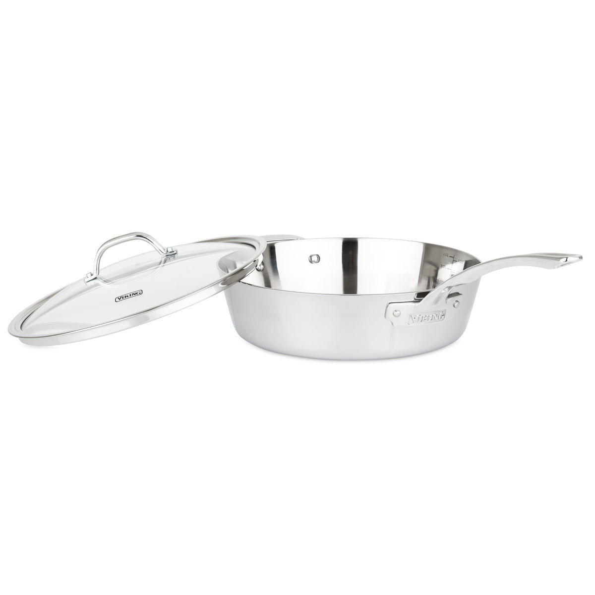 The Viking Contemporary 3-Ply 4.8-Quart Sauté Pan from Viking Culinary Products sits on a white background, featuring a long handle and glass lid beside it. Induction compatible, it’s ideal for versatile cooking.