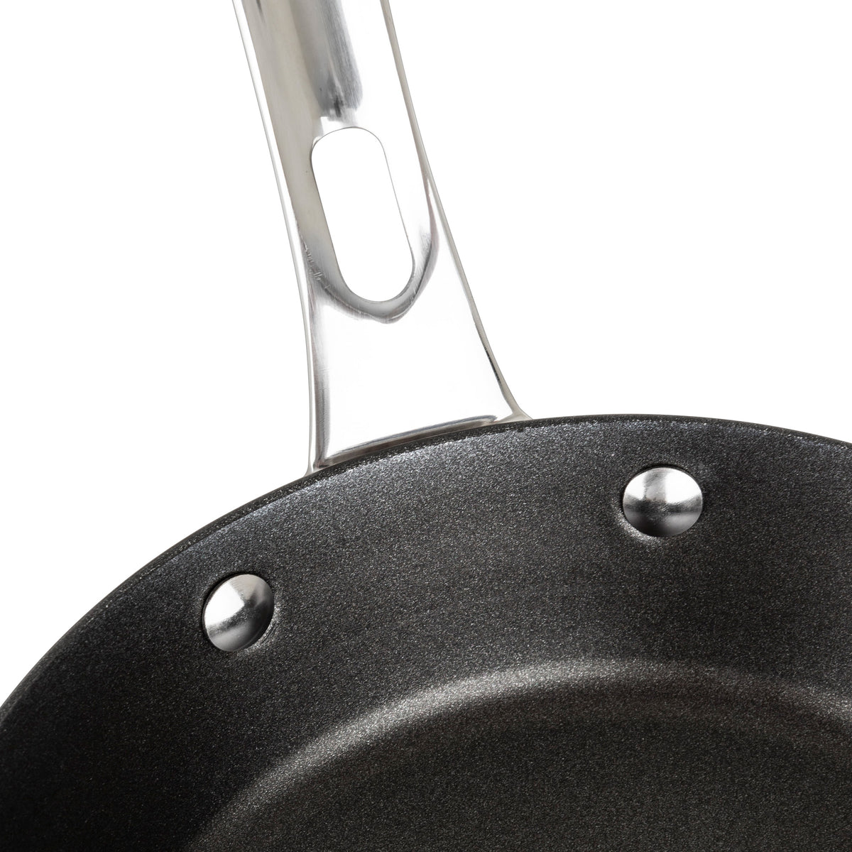 Close-up of the Viking Contemporary 3-Ply Stainless Steel 8-Inch Nonstick Fry Pan by Viking Culinary Products, showing its nonstick cooking surface, three metal rivets, and durable 3-ply construction with a shiny metal handle.