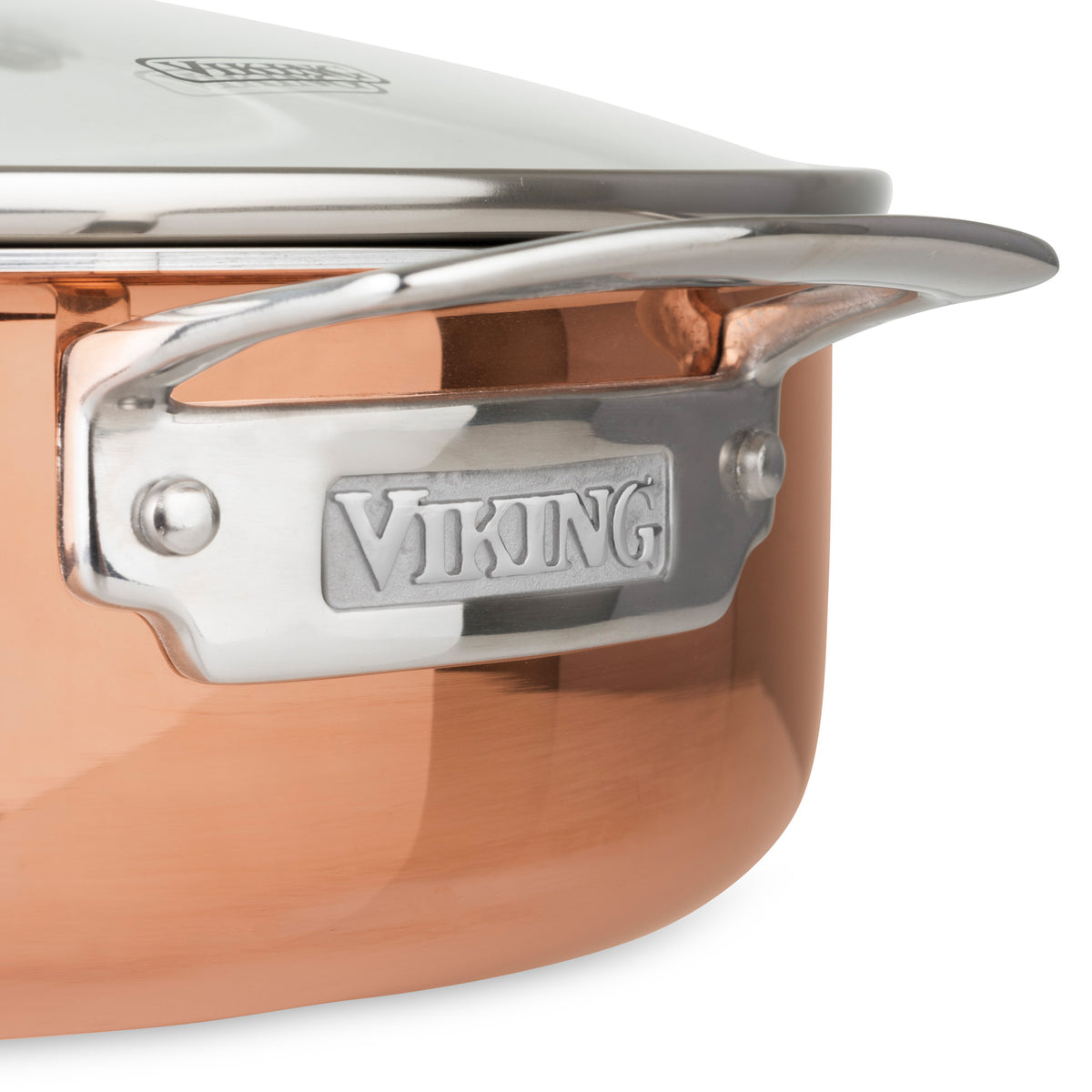 Close-up of the Viking 3-Ply Copper Clad 13-Piece Cookware Set by Viking Culinary Products, featuring a copper saucepan for high thermal conductivity, stainless steel handle with embossed brand name, and glass lid—showcasing durable tri-ply construction.