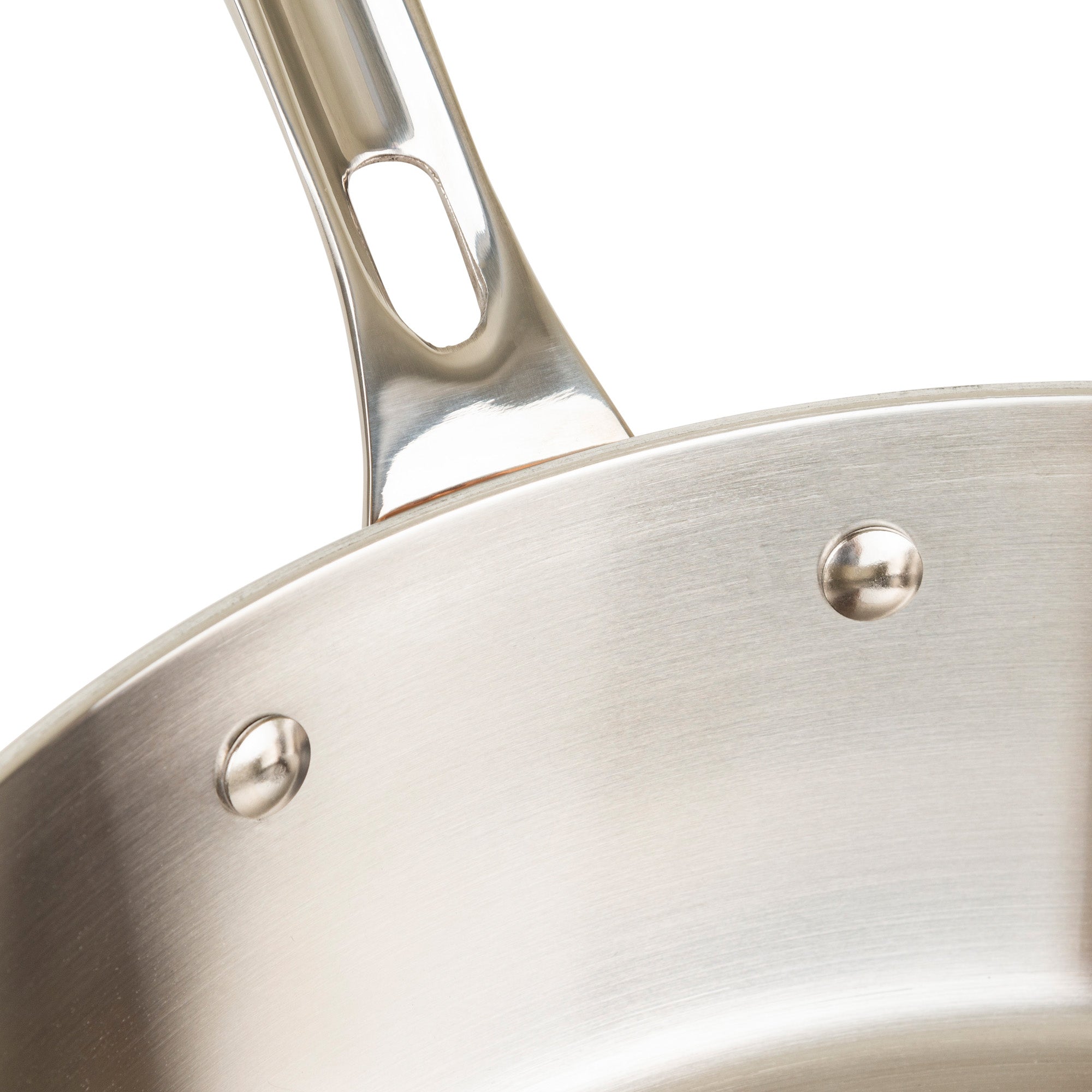 Close-up of the Viking Contemporary 4-Ply Copper Clad 9-Piece Cookware Set by Viking Culinary Products, featuring induction-capable stainless steel with a secure double-riveted handle and a glossy, light-reflecting surface.