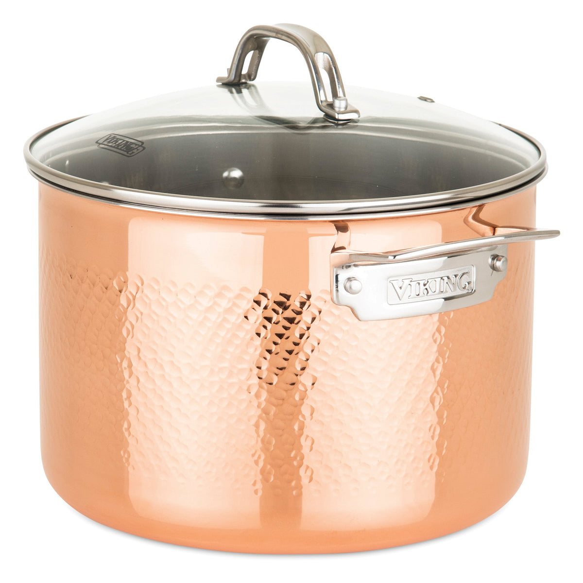 The Viking Culinary Products 3-Ply Hammered Copper Clad 10-Piece Cookware Set features durable hammered copper, glass lids, and ergonomic stainless steel handles, with the Viking name engraved on a side handle’s metal plate.