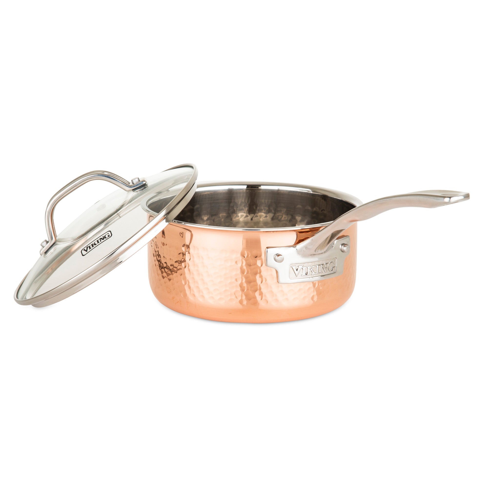 The Viking 3-Ply Hammered Copper Clad 10-Piece Cookware Set by Viking Culinary Products features durable copper exteriors, stainless steel interiors, ergonomic handles, and glass lids with handles and the Viking logo.