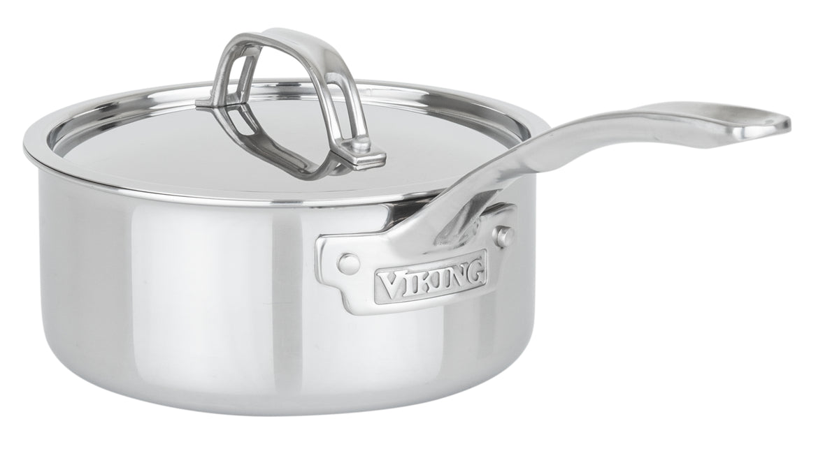 The Viking PureGlide Pro 3-Ply 2-Quart Sauce Pan with Metal Lid by Viking Culinary Products features a long handle and embossed brand plate—perfect for healthy meals and a must-have for any stainless steel cookware collection.