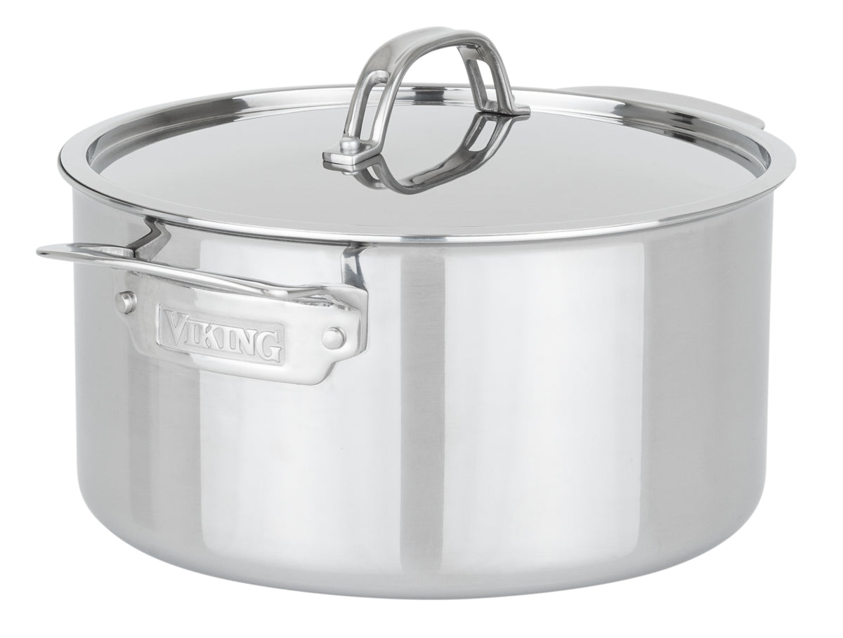 The Viking PureGlide Pro 3-Ply 6-Quart Dutch Oven by Viking Culinary Products features a shiny stainless steel body, metal lid, long and short handles, and the brand name engraved on the side handle.
