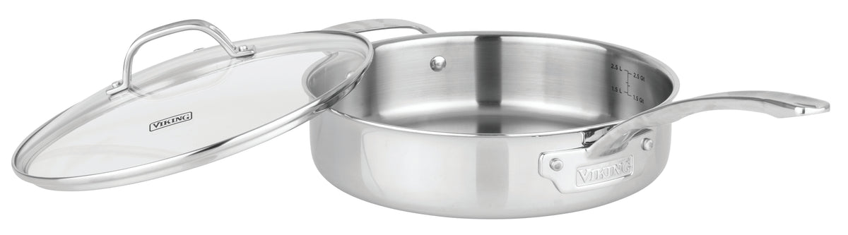 The Viking Culinary Products Artisan 3-ply Stainless Steel 11-Piece Cookware Set with Glass Lids is shown, featuring a pan with a long handle, partial glass lid, interior measurement markings, induction compatibility, and a shiny finish.