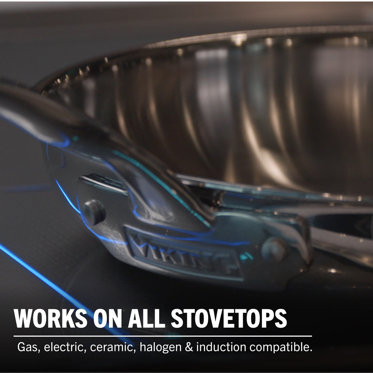 A close-up of the Viking Culinary Products Artisan 3-ply Stainless Steel 11-Piece Cookware Set with glass lids on a stovetop. Works on gas, electric, ceramic, halogen & induction cooktops, plus oven safe for versatile cooking.
