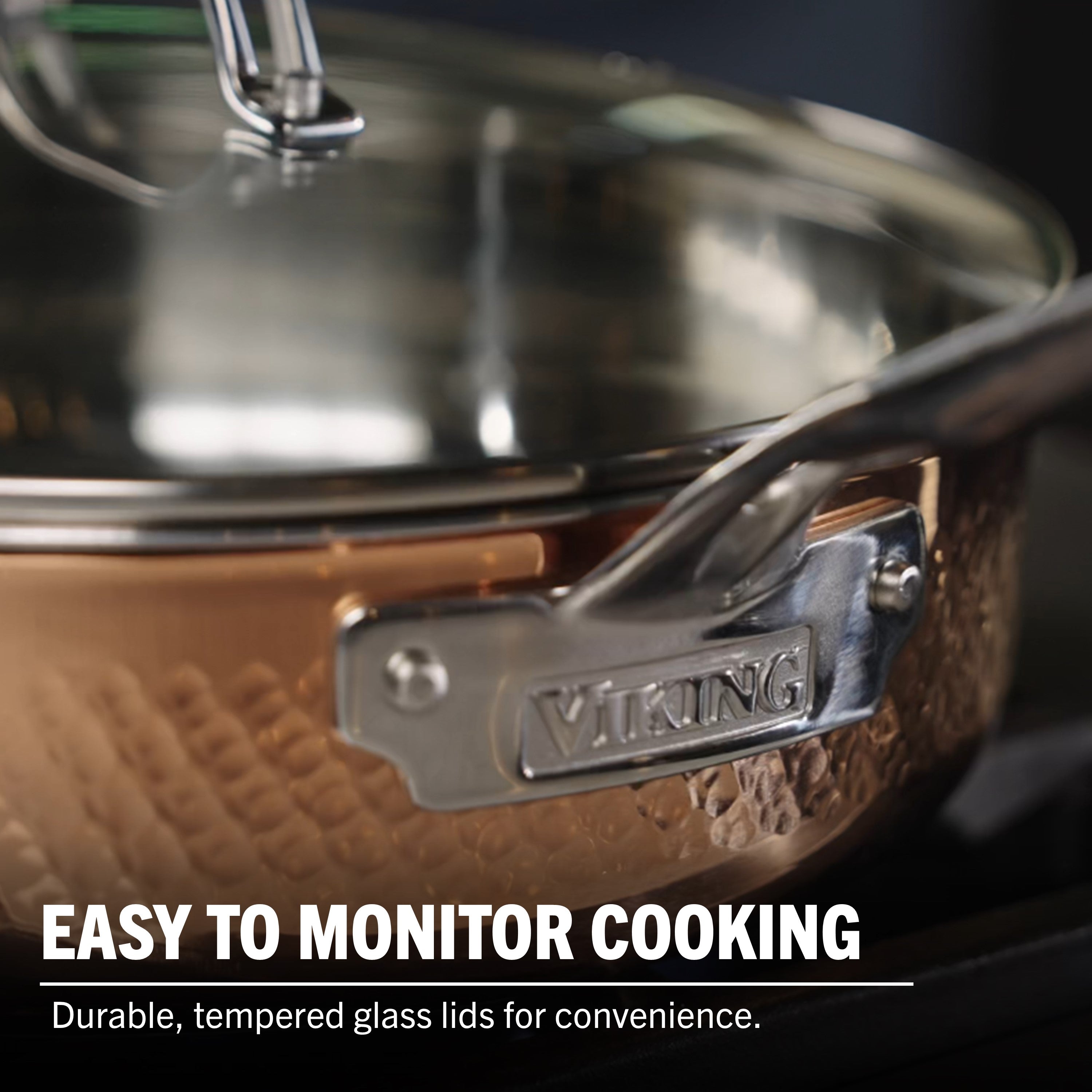 A close-up of the Viking Culinary Products 3-Ply Hammered Copper Clad 10-Piece Cookware Set with tempered glass lids. The text reads: Easy to monitor cooking with durable glass lids and a stainless steel interior for convenience.