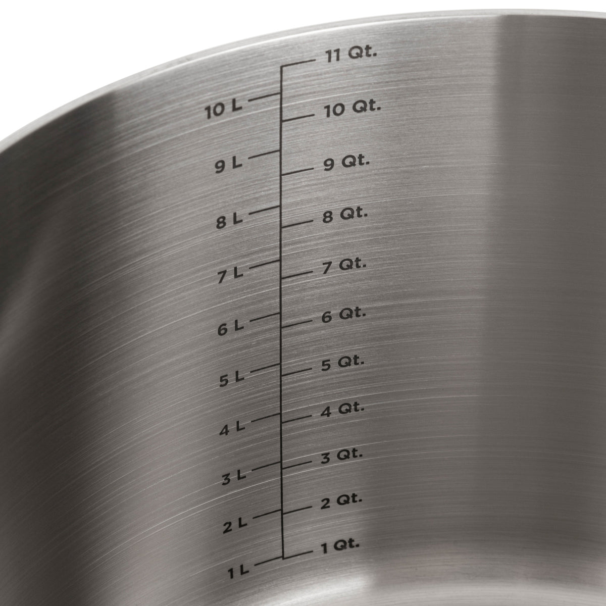 Close-up of the Viking 3-Ply Stainless Steel 12-Quart Stock Pot by Viking Culinary Products, featuring a vertical measurement scale in liters and quarts (up to 11 Qt.), and dishwasher safe for easy cleanup.