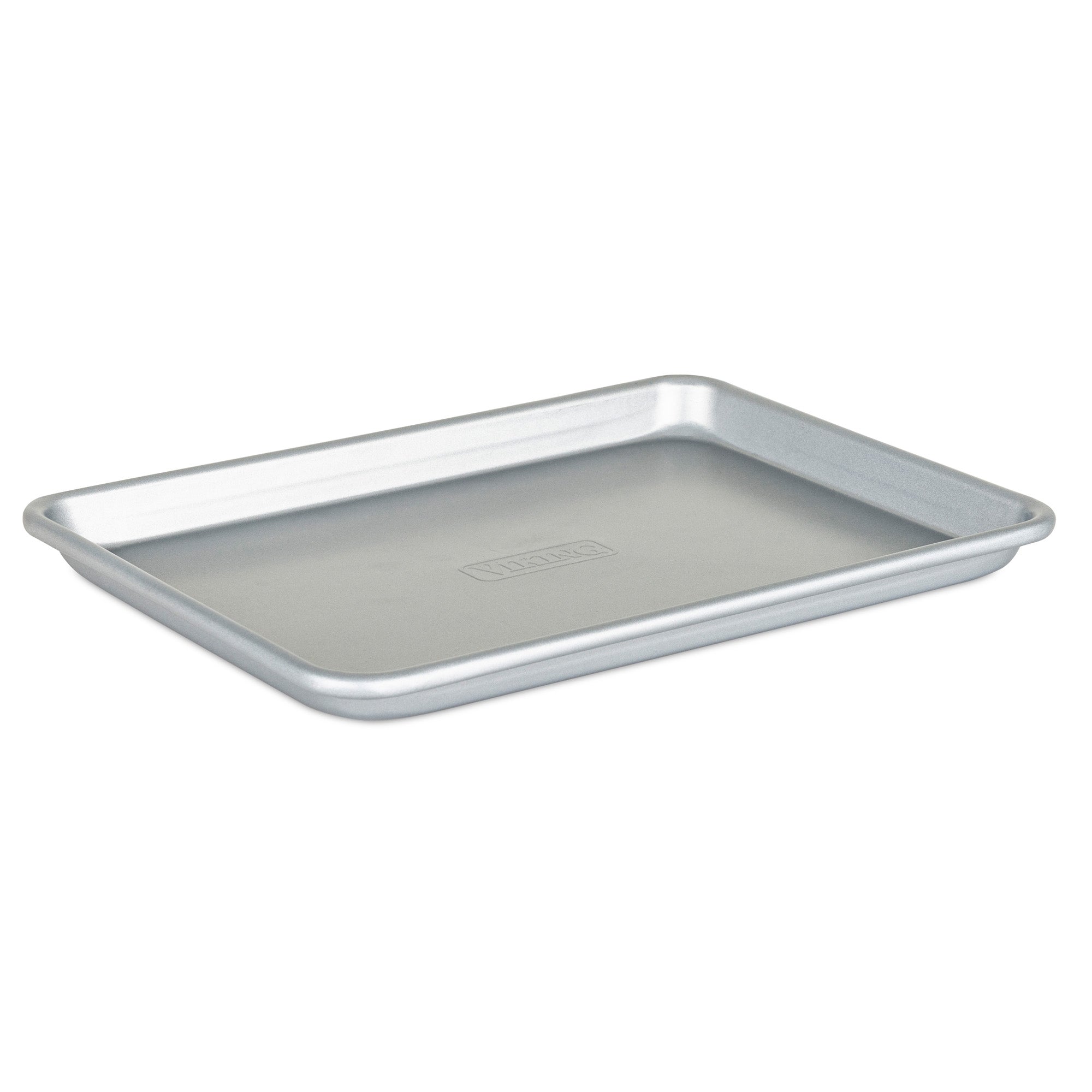 The Viking 13-Inch Aluminized Nonstick Baking Sheet by Viking Culinary Products is a rectangular, silver metal sheet with slightly raised edges, made from heavy duty aluminized steel and shown on a white background.