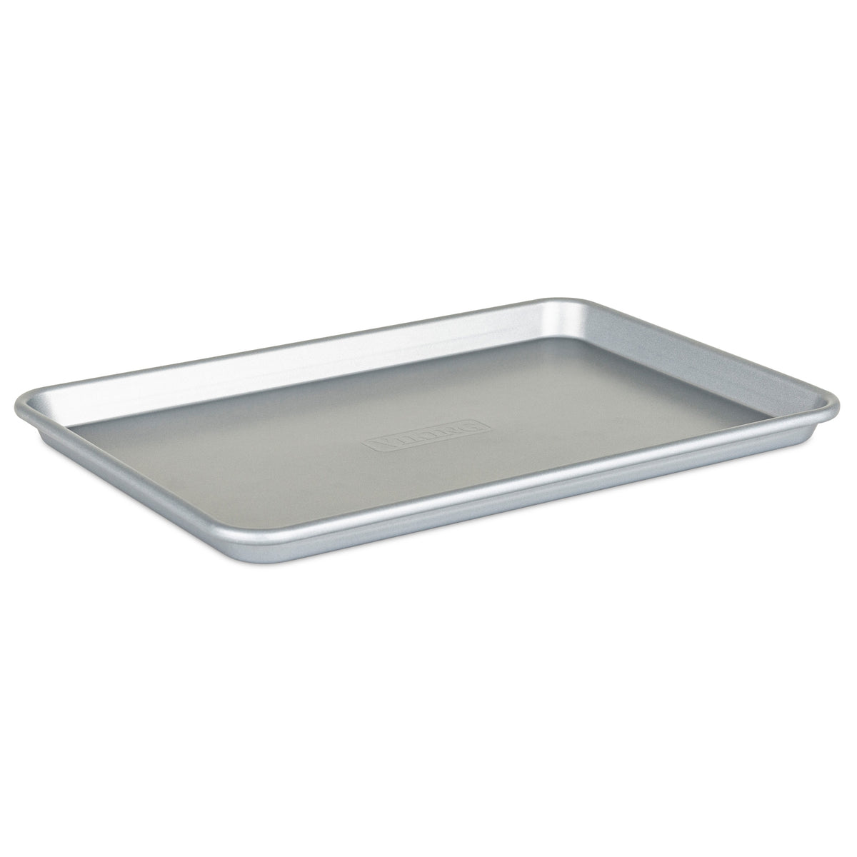 The Viking Culinary Products Viking 15-Inch Aluminized Nonstick Baking Sheet features slightly raised edges and a smooth, reflective surface, ideal for baking or roasting, ensuring lasting performance and durability.