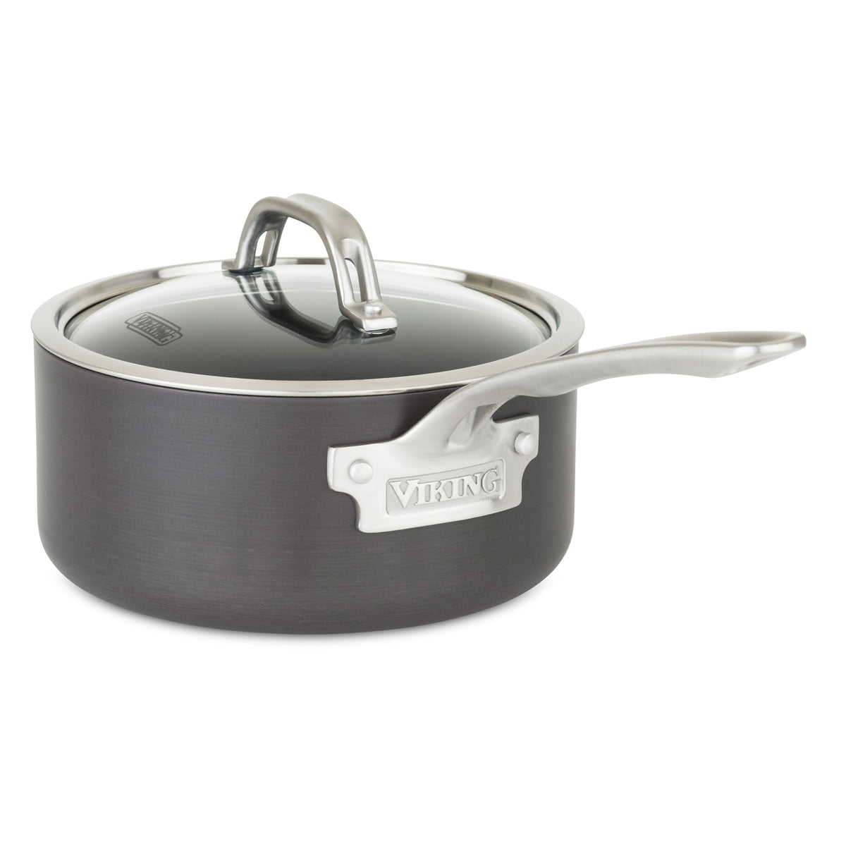 A black Viking Culinary Products hard anodized nonstick saucepan with a long silver handle and glass lid, part of the Viking Hard Anodized Nonstick 10-Piece Cookware Set, featuring a branded metal plate on the side.