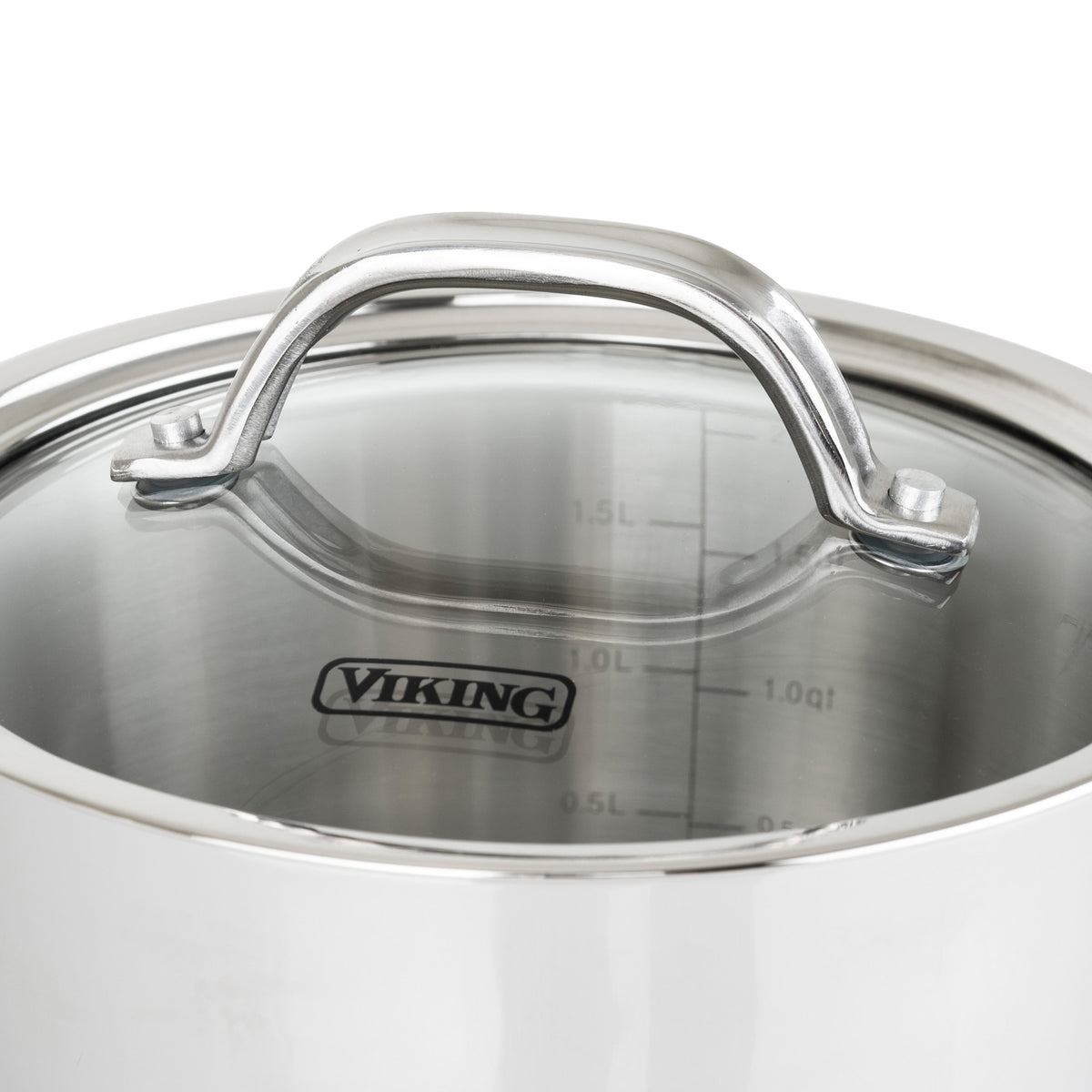 A close-up of the Viking Contemporary 3-Ply 2.4-Quart Sauce Pan with Glass Lid by Viking Culinary Products, showing its non-reactive stainless steel, cool-touch metal handle, measurement markings inside, and induction compatibility.