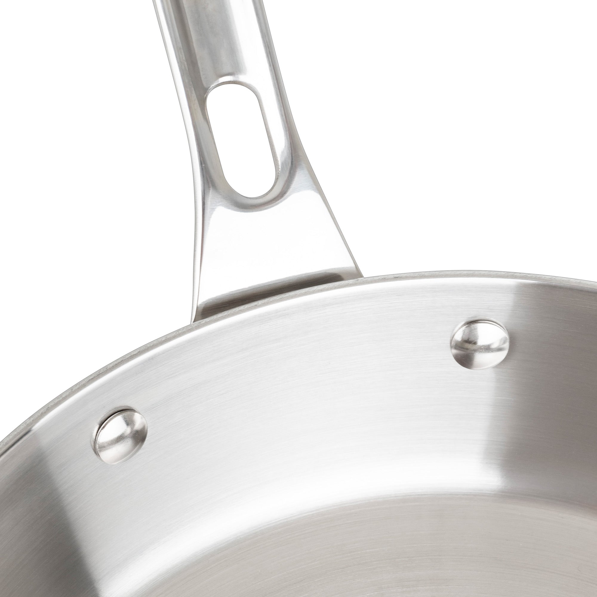 Close-up of a Viking Culinary Products Contemporary 3-Ply Stainless Steel frying pan from the 7-Piece Cookware Set, featuring a riveted handle and smooth, brushed induction-compatible surface with glass lids.