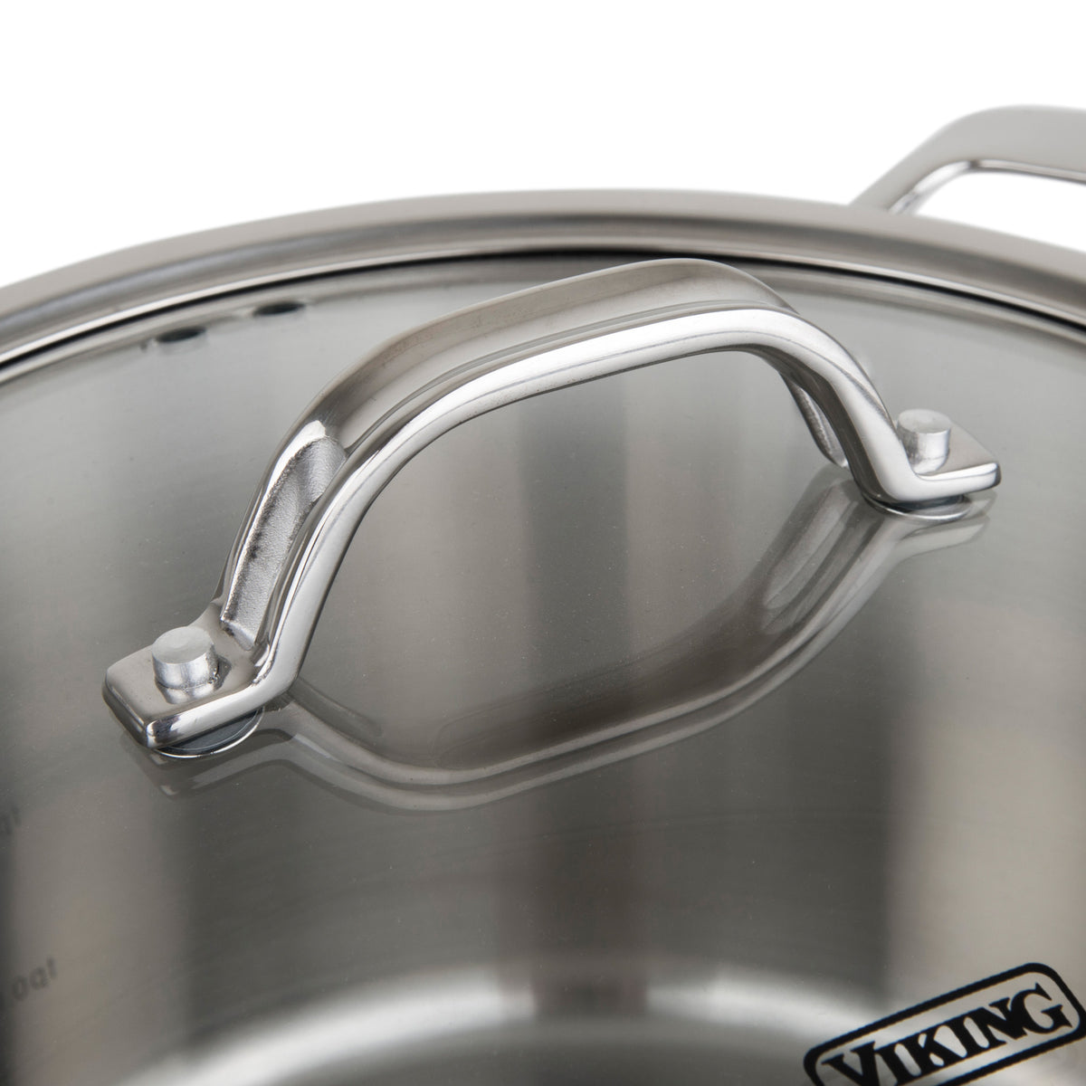 Close-up of a Viking Contemporary 3-Ply Stainless Steel pot from the 12-piece cookware set by Viking Culinary Products, featuring a sturdy metal handle and visible brand logo. The shiny, reflective surface highlights its induction compatibility.