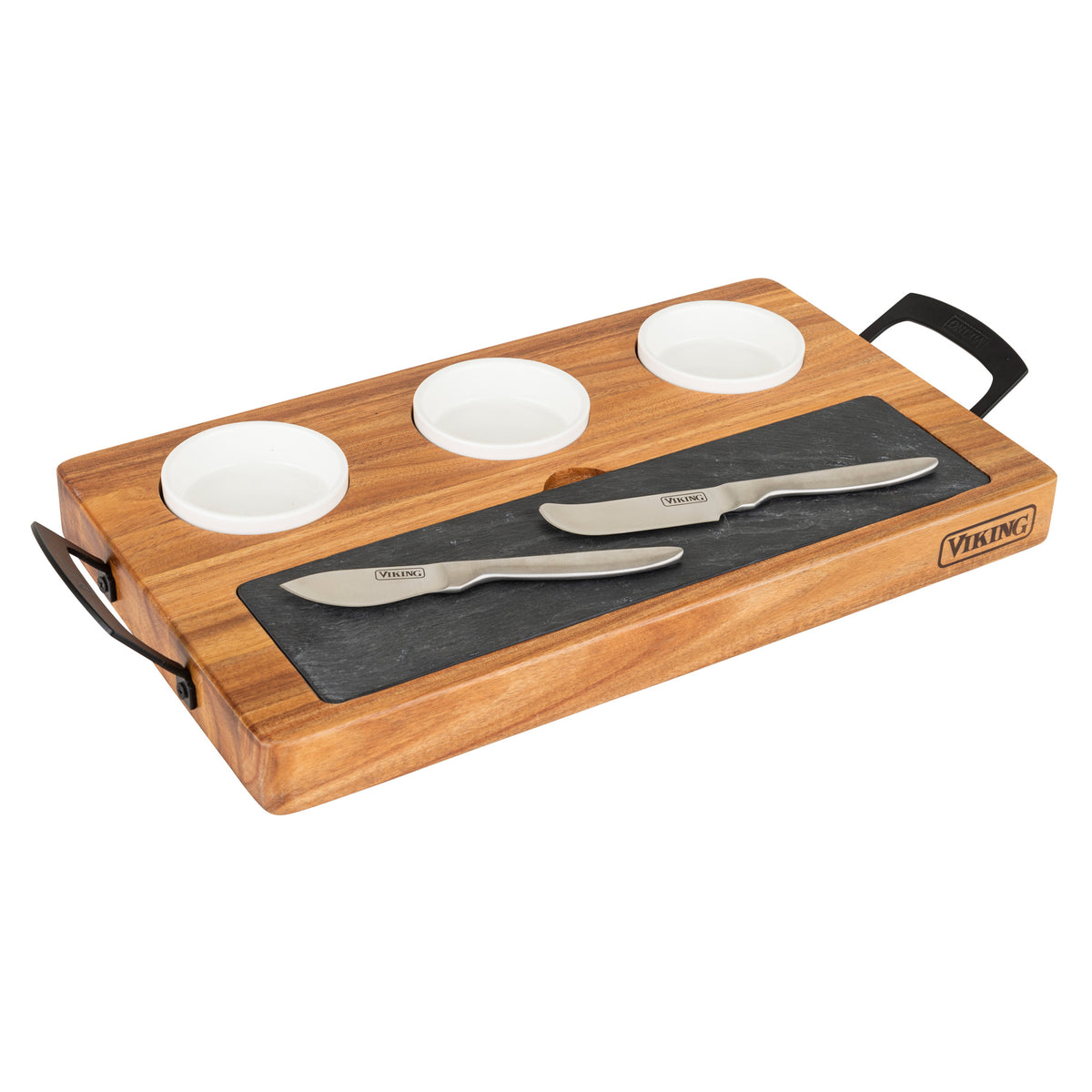 The Viking 7-Piece Acacia Wood Slate Cheese Board Set by Viking Culinary Products features a sleek slate insert, three white ceramic bowls, two stainless steel cheese knives, black handles, and is branded with the Viking logo on the front corner.