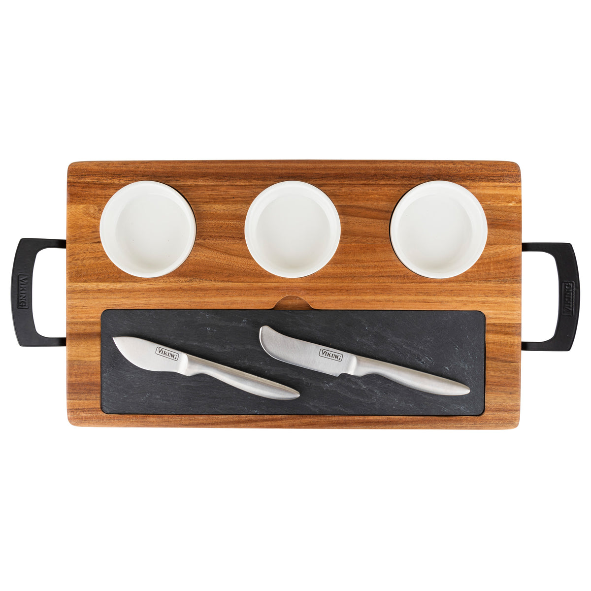 The Viking 7-Piece Acacia Wood Slate Cheese Board Set by Viking Culinary Products features black handles, a slate insert, three white bowls on top, and three stainless steel cheese knives arranged below.
