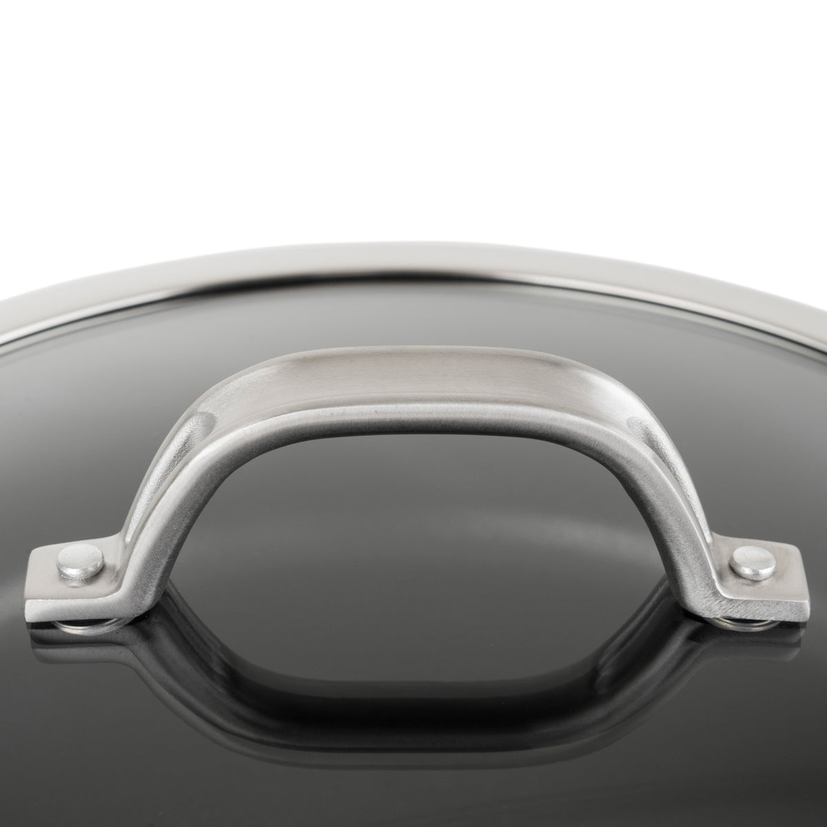 Close-up of the Viking Culinary Products stainless steel stay-cool handle on the glass lid of the Viking Hard Anodized Nonstick 1-Quart Sauce Pan. The reflective, minimalistic design stands out against a white background.